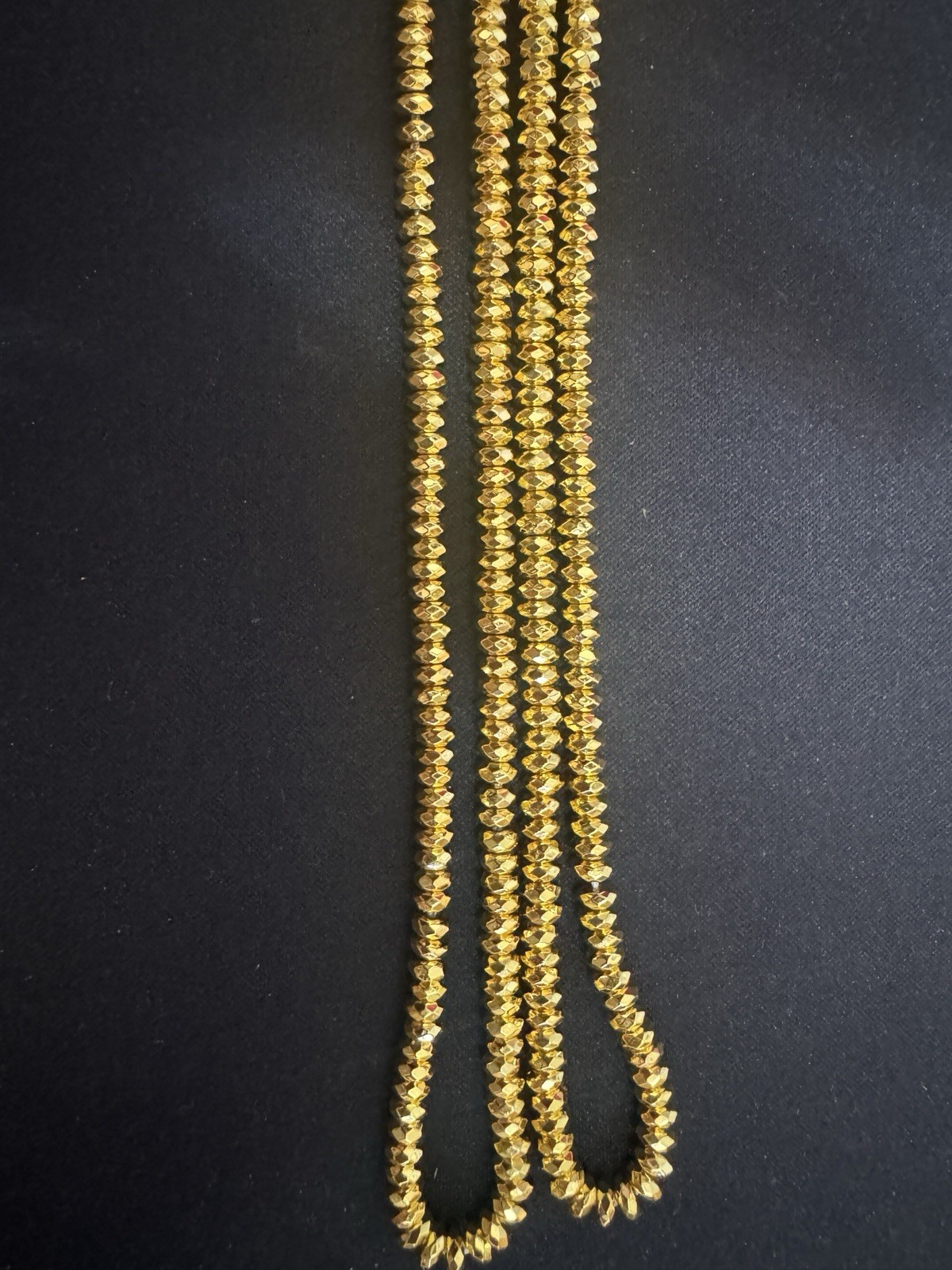4mm gold hematite faceted roundel 15in