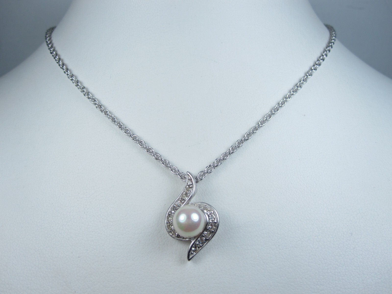 Nina Ricci Rhodium Plated Pendant with Swarovski Crystals & Pearls – 16-18″ 4075
