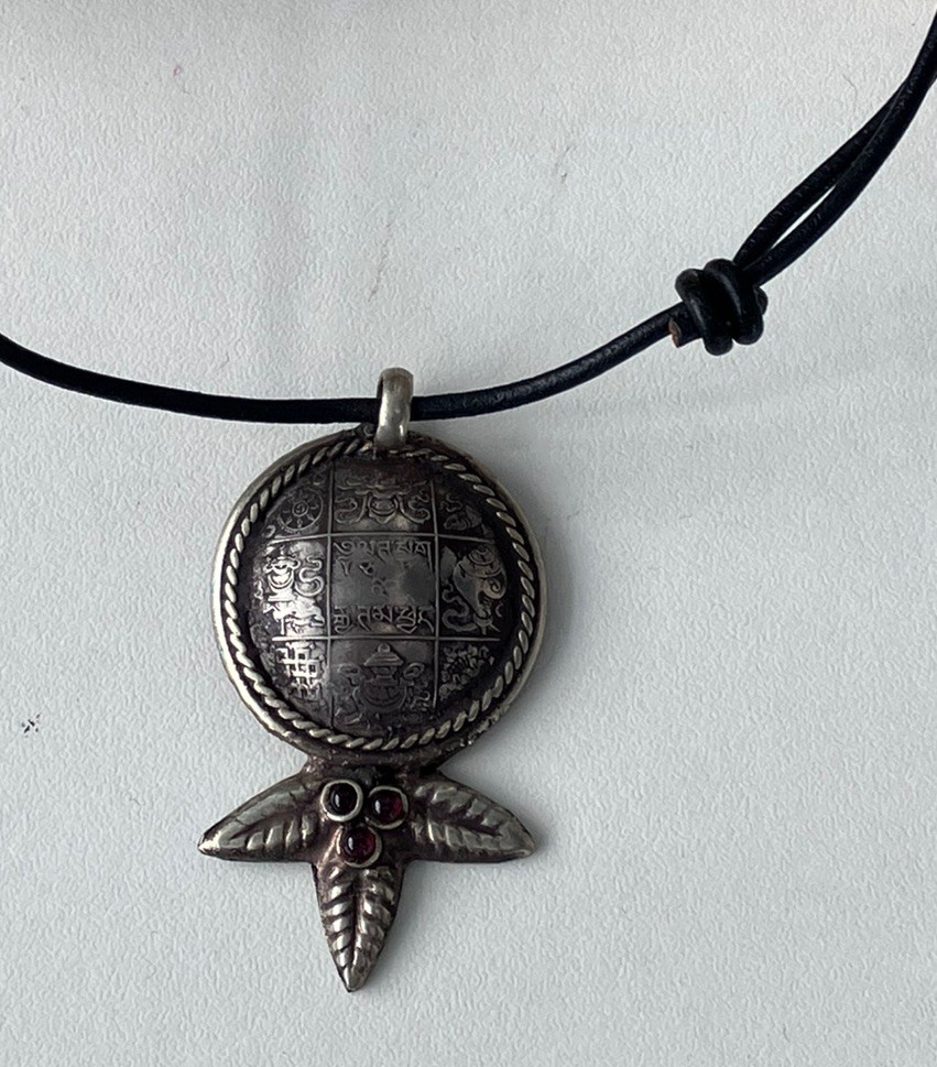 Vintage 1990s Nepal Tibet marijuana leaf coin pendant