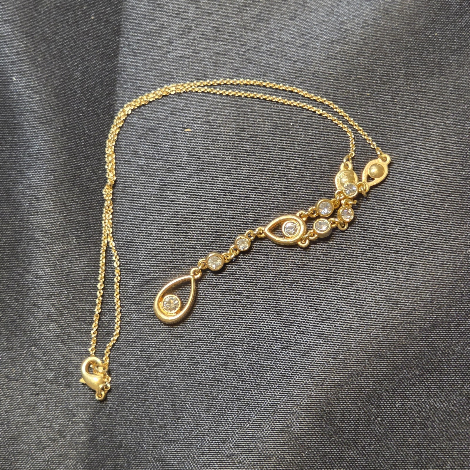 Gold-tone Y Necklace With Sparkling Crystal Drop Accents. Elegant Everyday Wear
