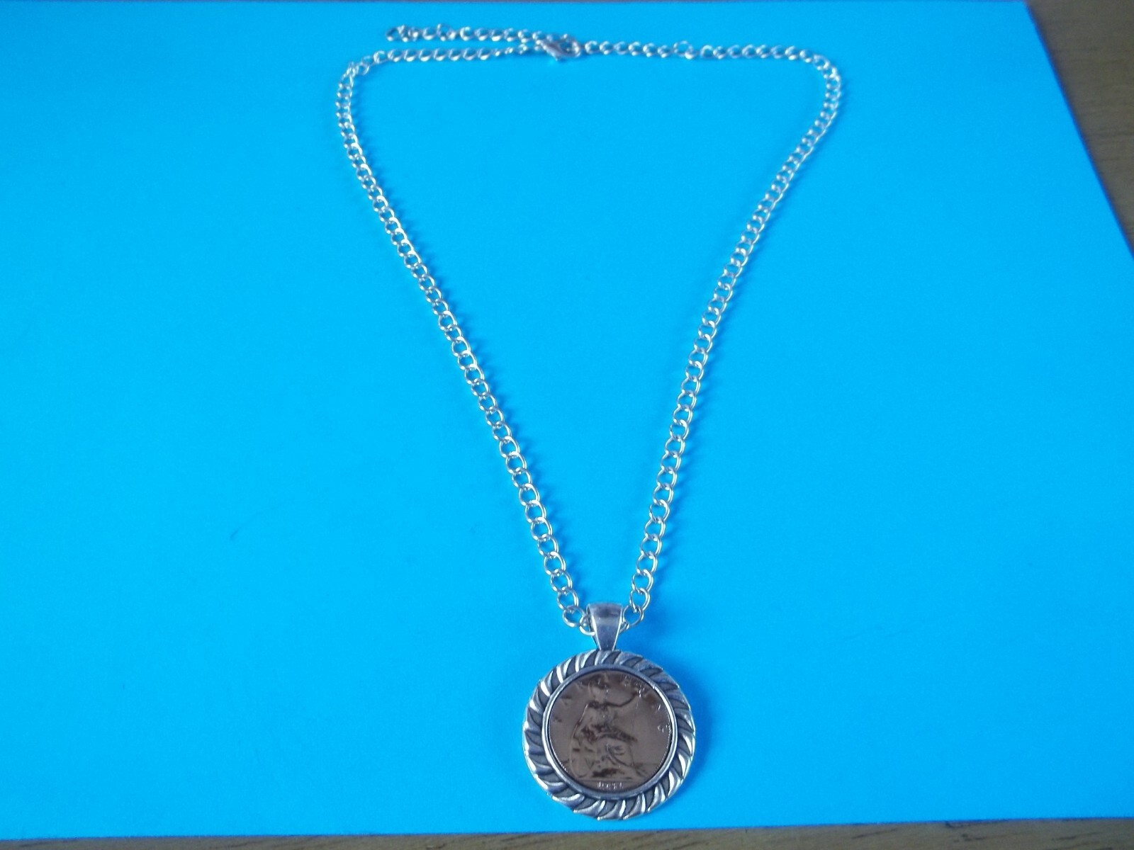 BRITANNIA FARTHING – LIMITED EDITION – SILVER CASED CURB NECKLACE – 1911 to 1936