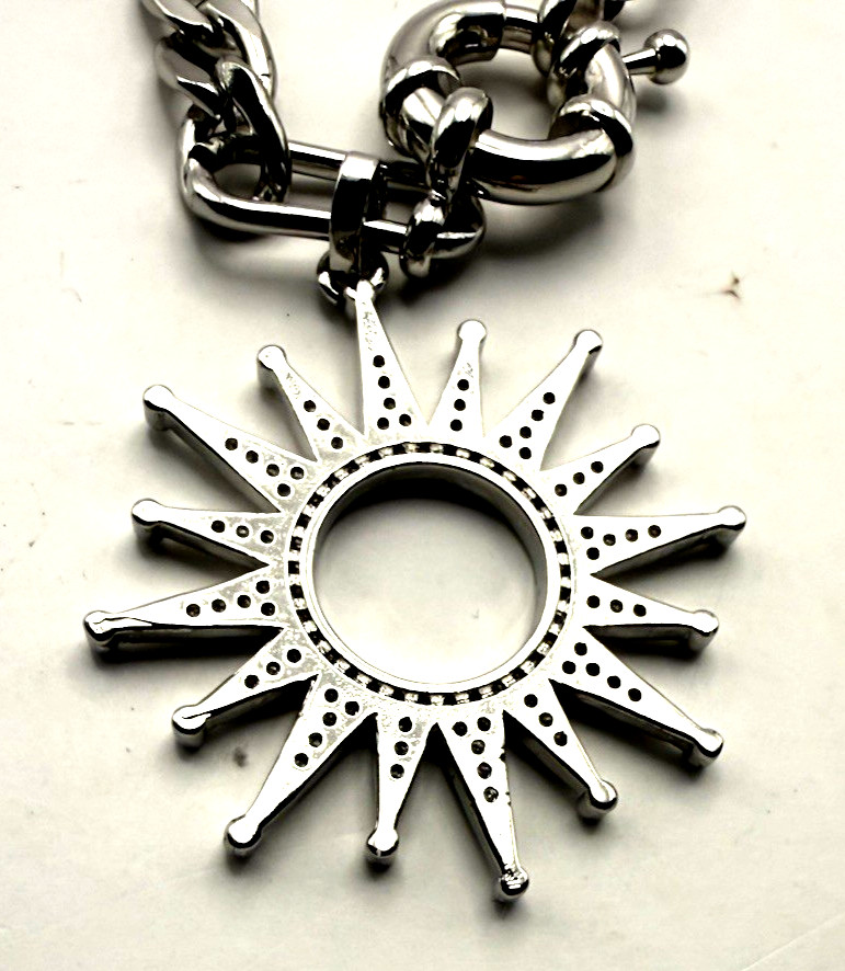 MELANIA CLARA 17″ Silver Tone Crystal Sunburst Pendant Front Clasp Necklace