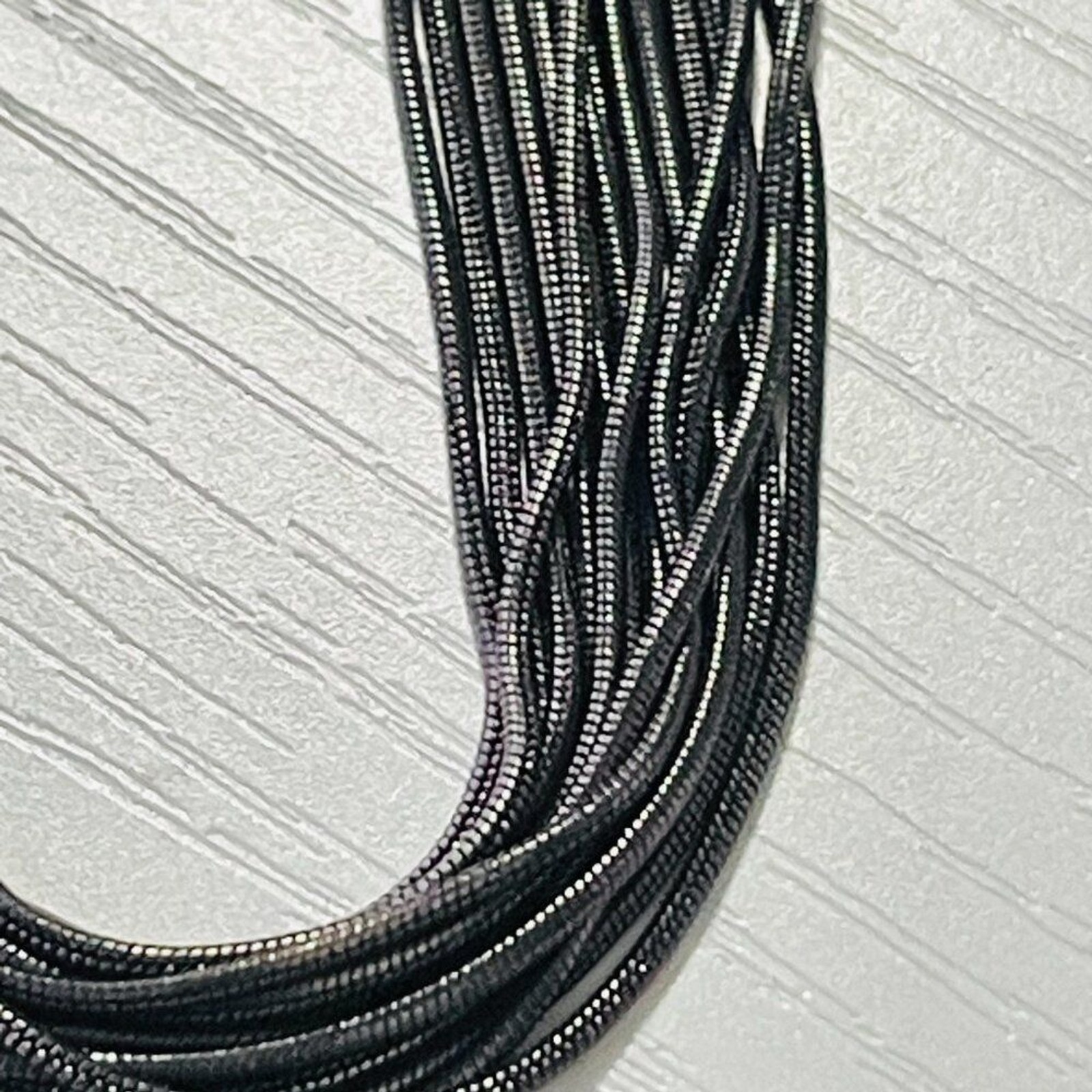 High Carbon Steel Piano Wire 14-Strand Necklace Gray Ribbon
