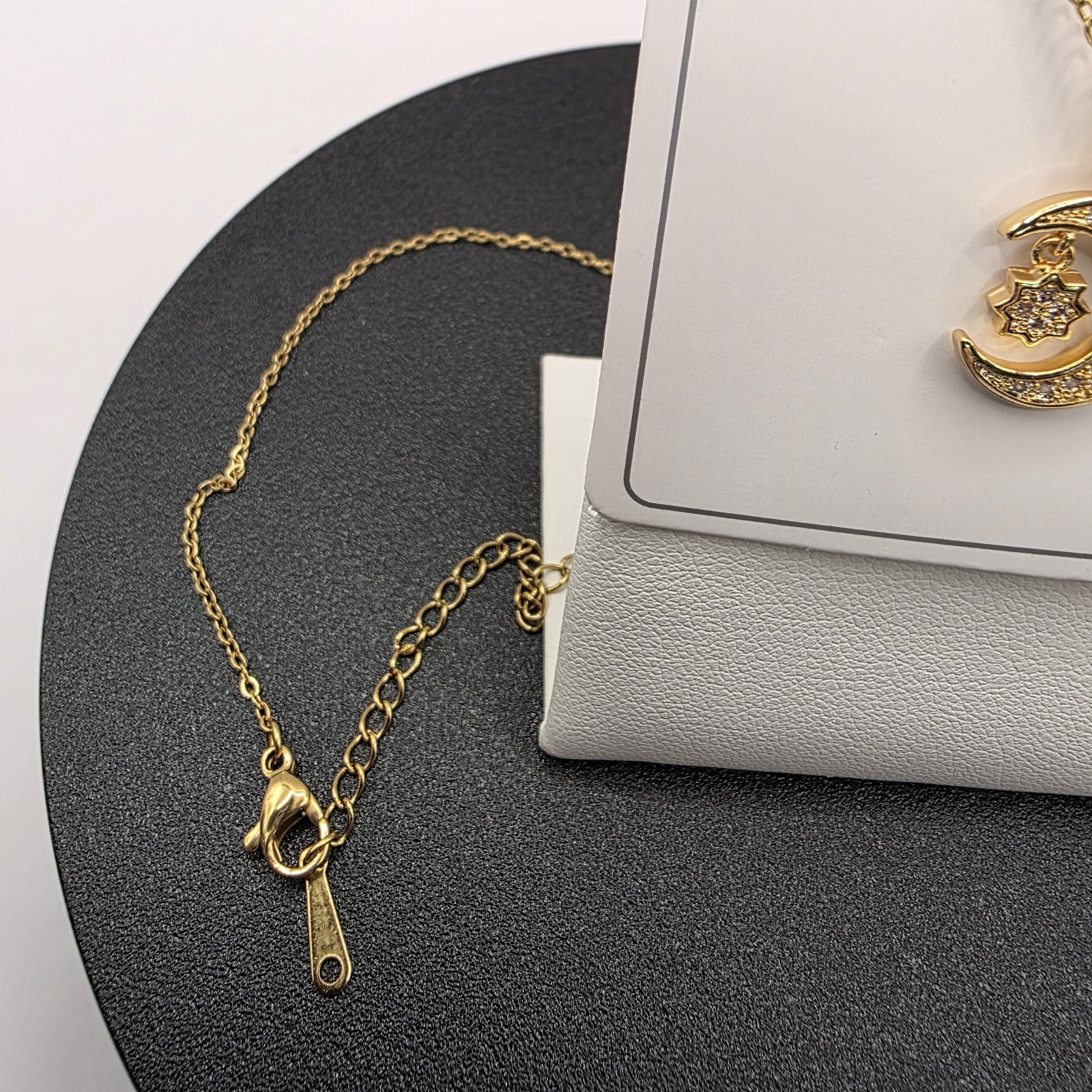 Stainless Steel Copper Plated 16″Necklace w/15mm Cubic Zirconia Half Moon& Star