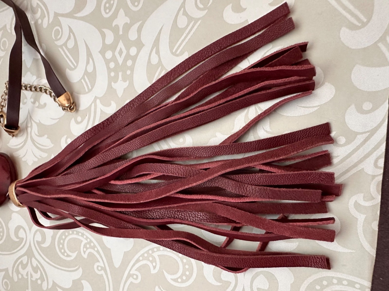 Chicos Pendant Necklace With Burgundy Beads & Faux Leather Tassel