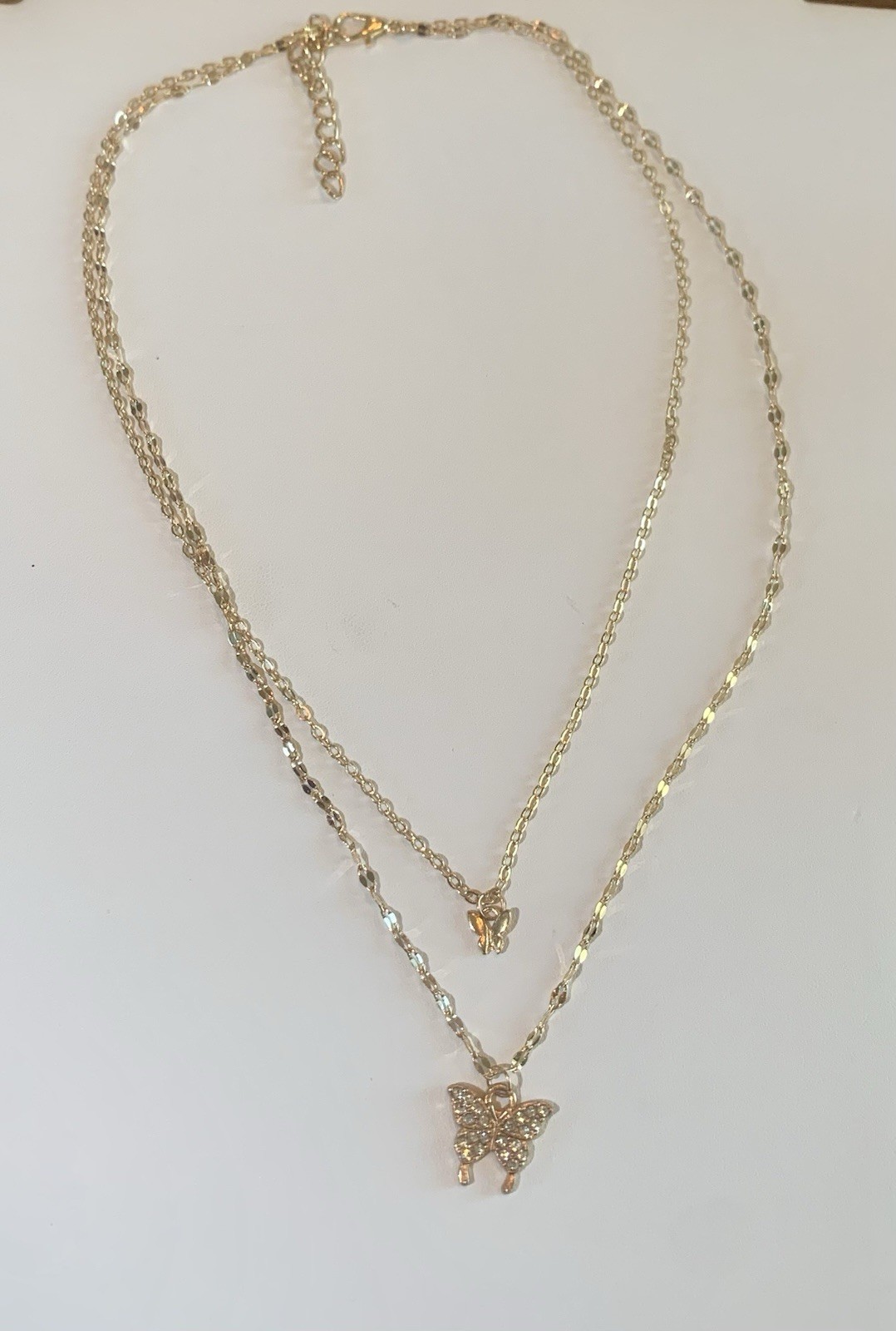 Gold Tone Layered Butterfly Charm Necklace with Clear Crystal Pendant, 16.14″