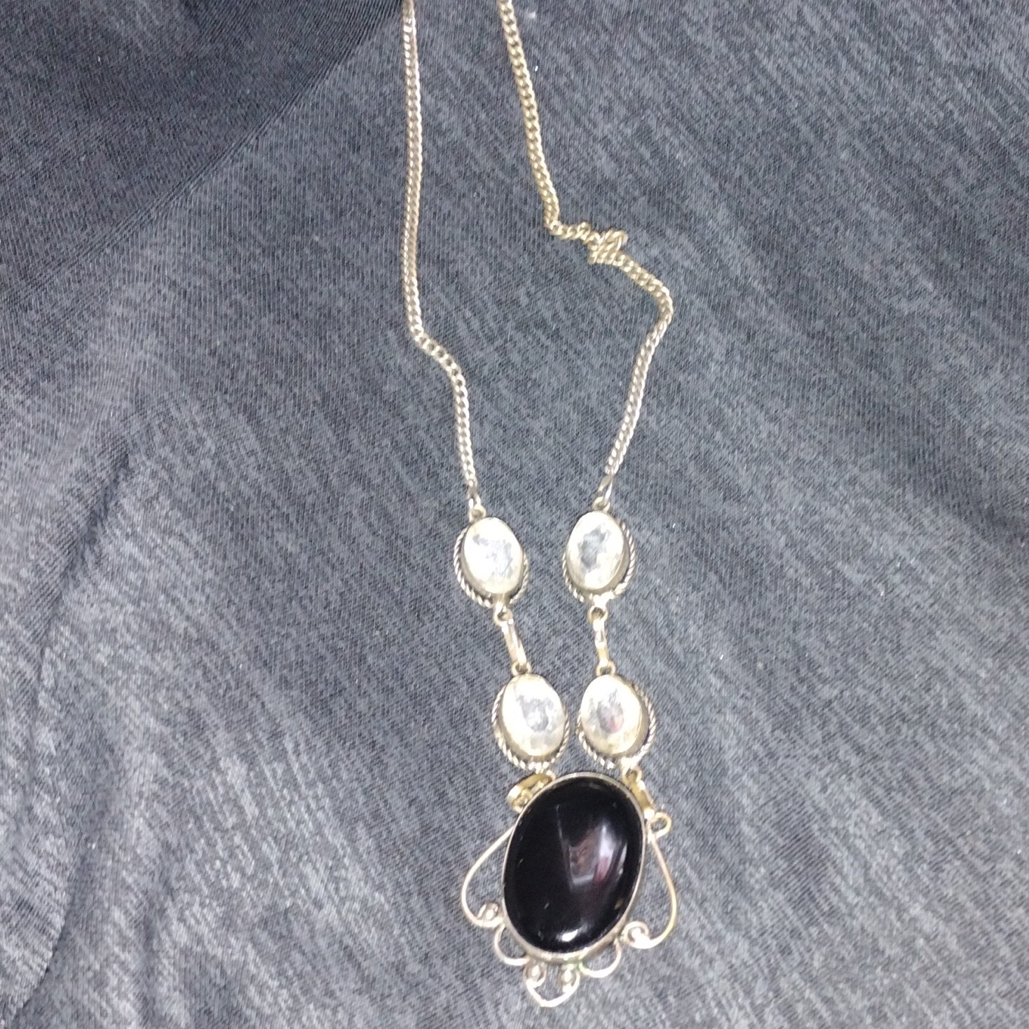 Silver Tone Necklace with Black Oval Cabochon Pendant & Clear Oval Stones