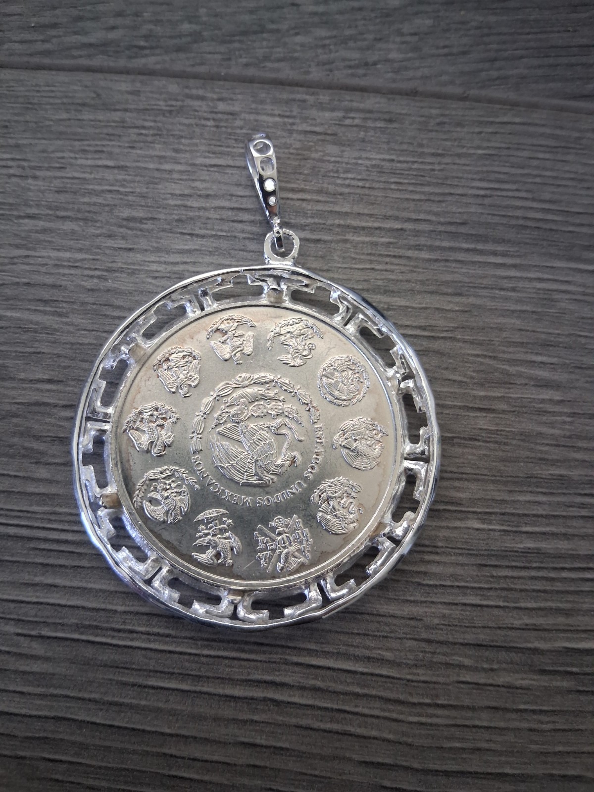 moneda centenario libertad de 1 OZ , moneda y bizel plata 925 plata real MX