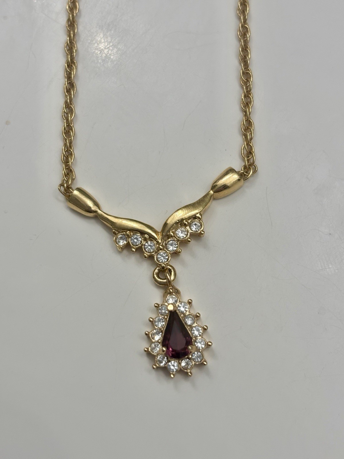 Roman 16 Inch Gold Colored Necklace With Faux Ruby Pendant