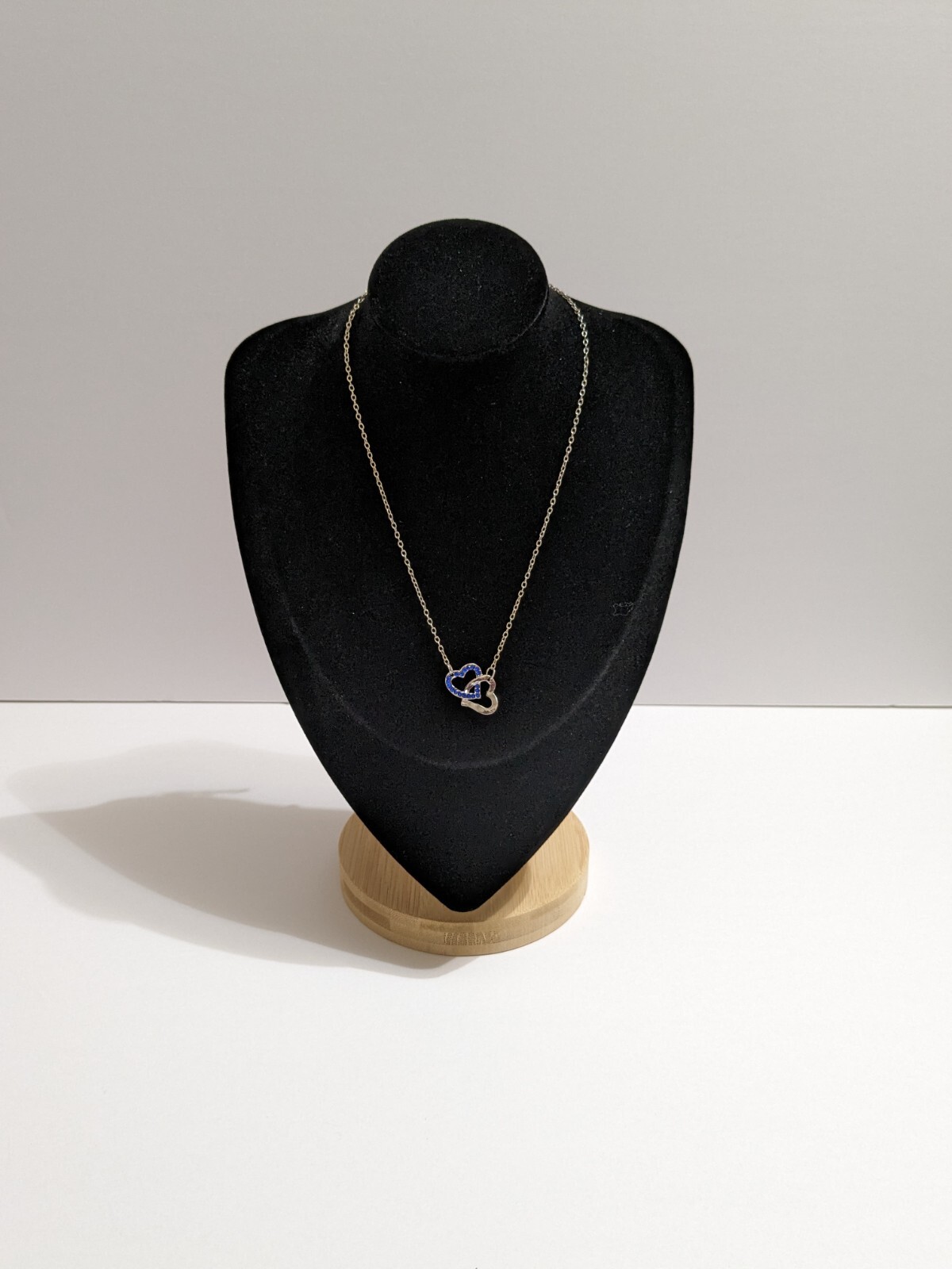 Interlinked Hearts Blue Rhinestones & Silver Tone Pendant Necklace. 16″. 2″ Ext.