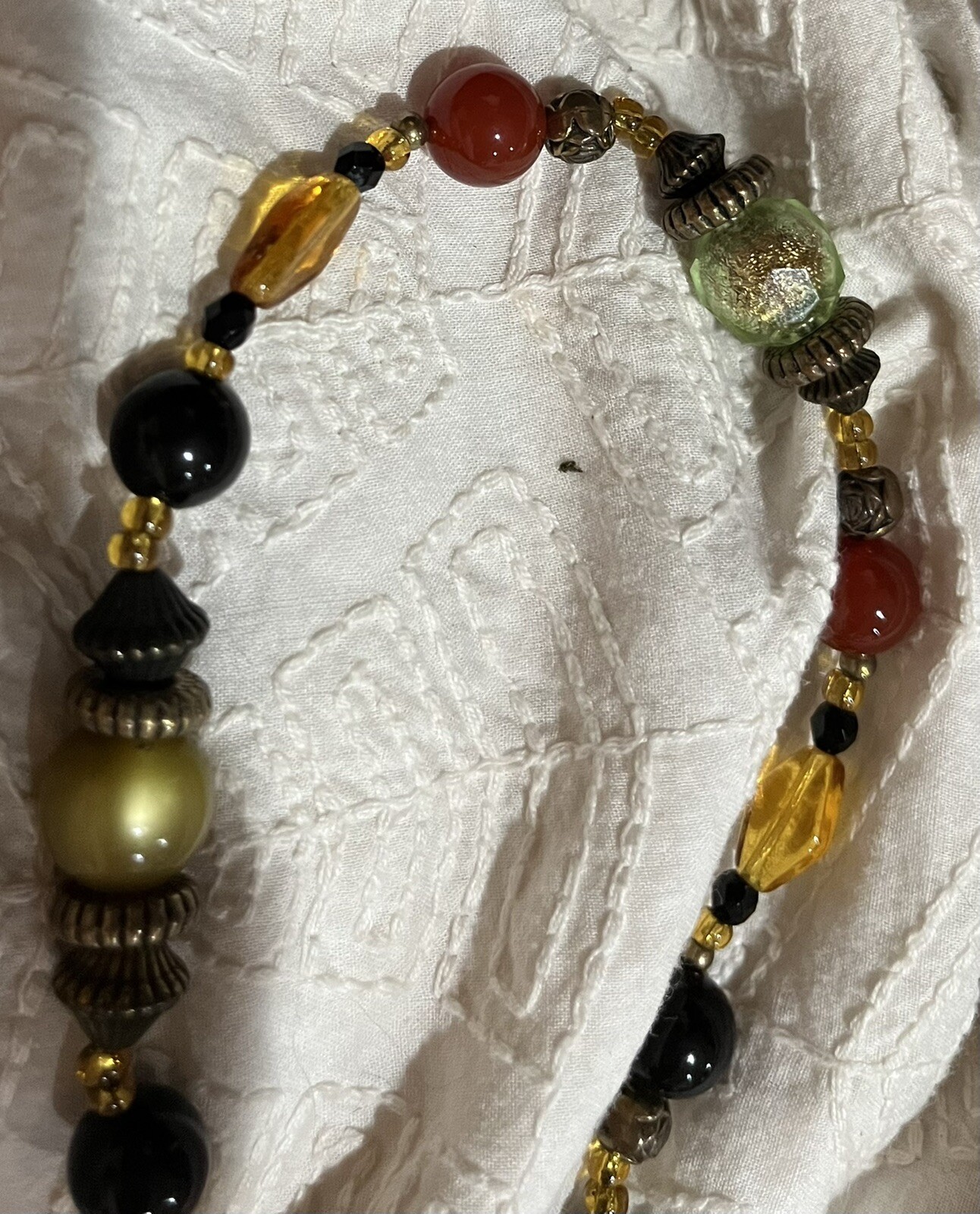 brass tone necklace with bali beads and gemstone Beads
