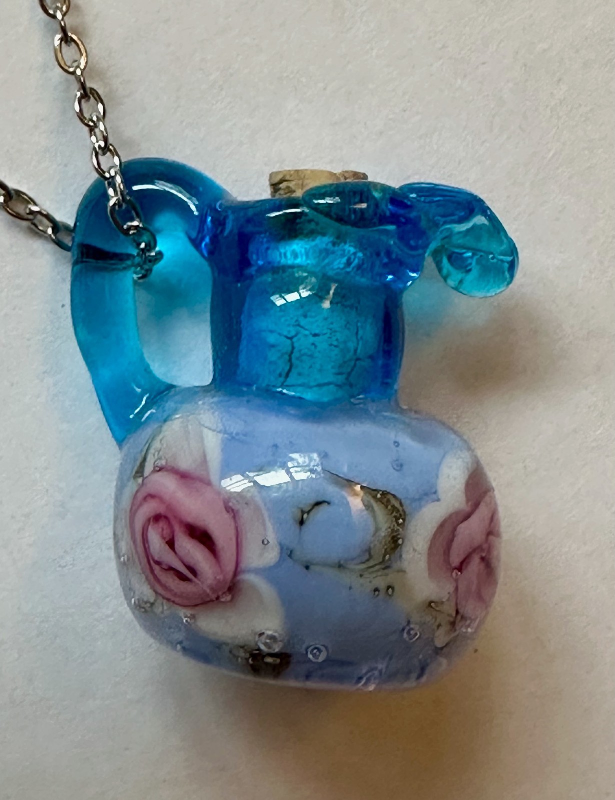 Vase Urn with handle blue glass with flower & cork pendant 1″ necklace 24″ steel