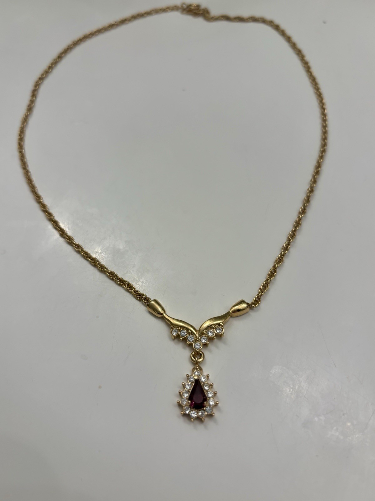Roman 16 Inch Gold Colored Necklace With Faux Ruby Pendant