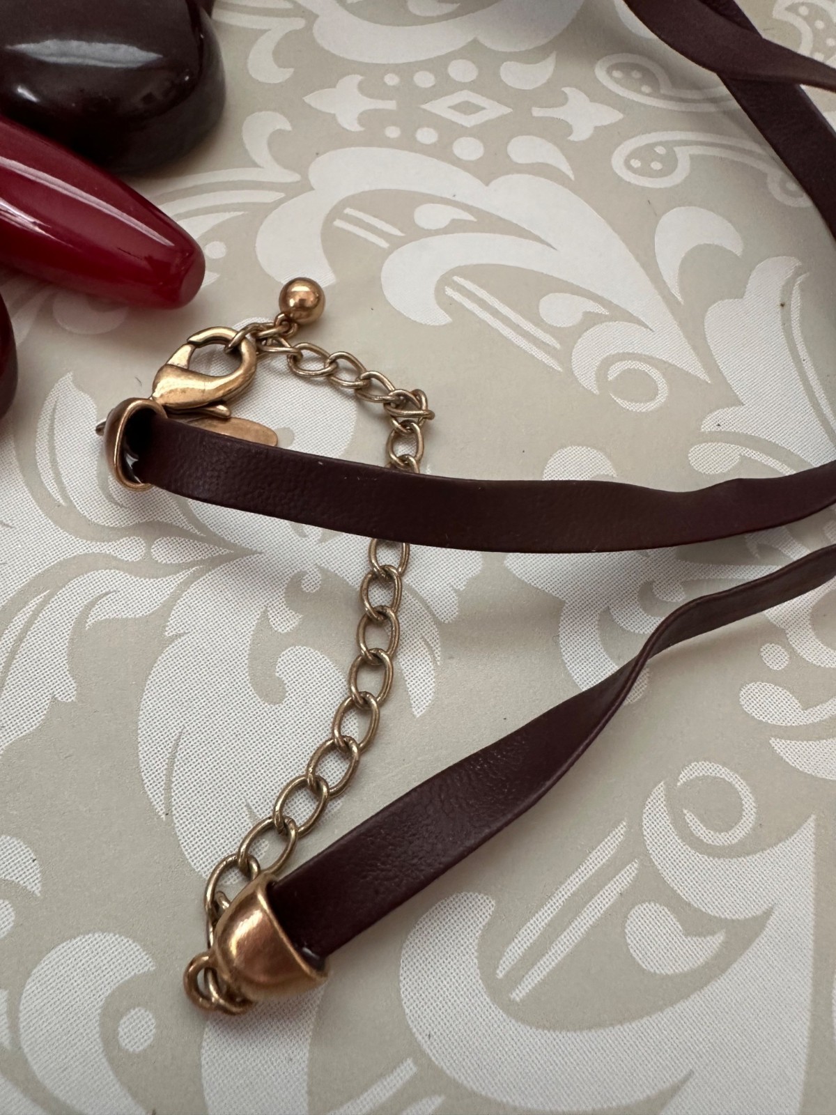 Chicos Pendant Necklace With Burgundy Beads & Faux Leather Tassel