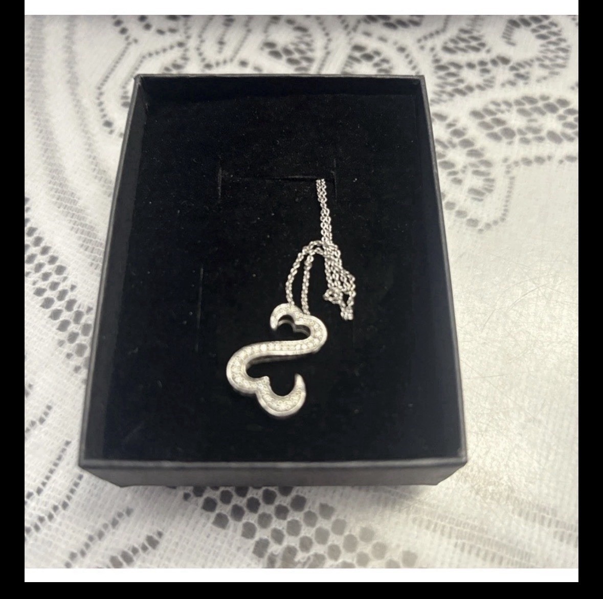JAme Seymore open heart white gold chain and pendant 1/4 carat diamond