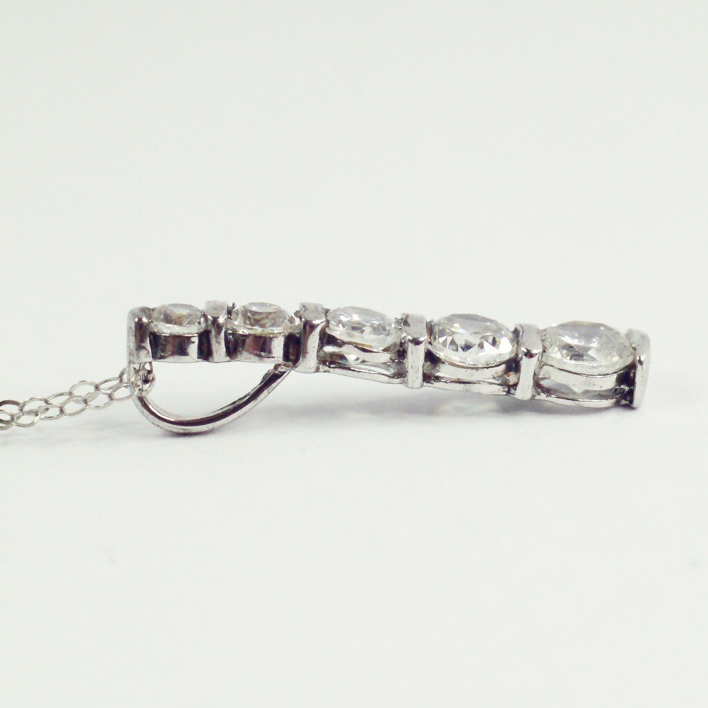 Sterling silver white/colorless CZ graduated five stone pendant necklace