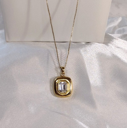 Emerald Cut Clear Crystal Goldtone Bezel Set Pendant Necklace – 32″ – Brilliant