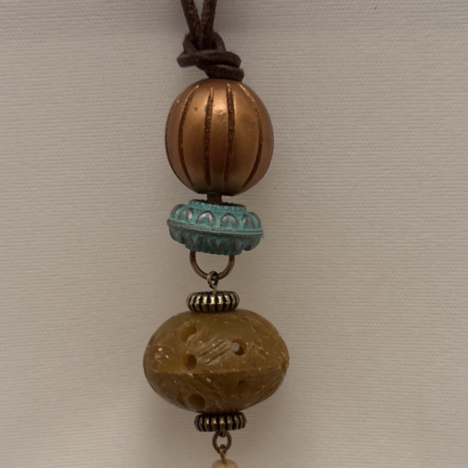 Vtg Multicolor Wood, Metal & Carved Bead Cord Necklace with Asian Charm Pendant