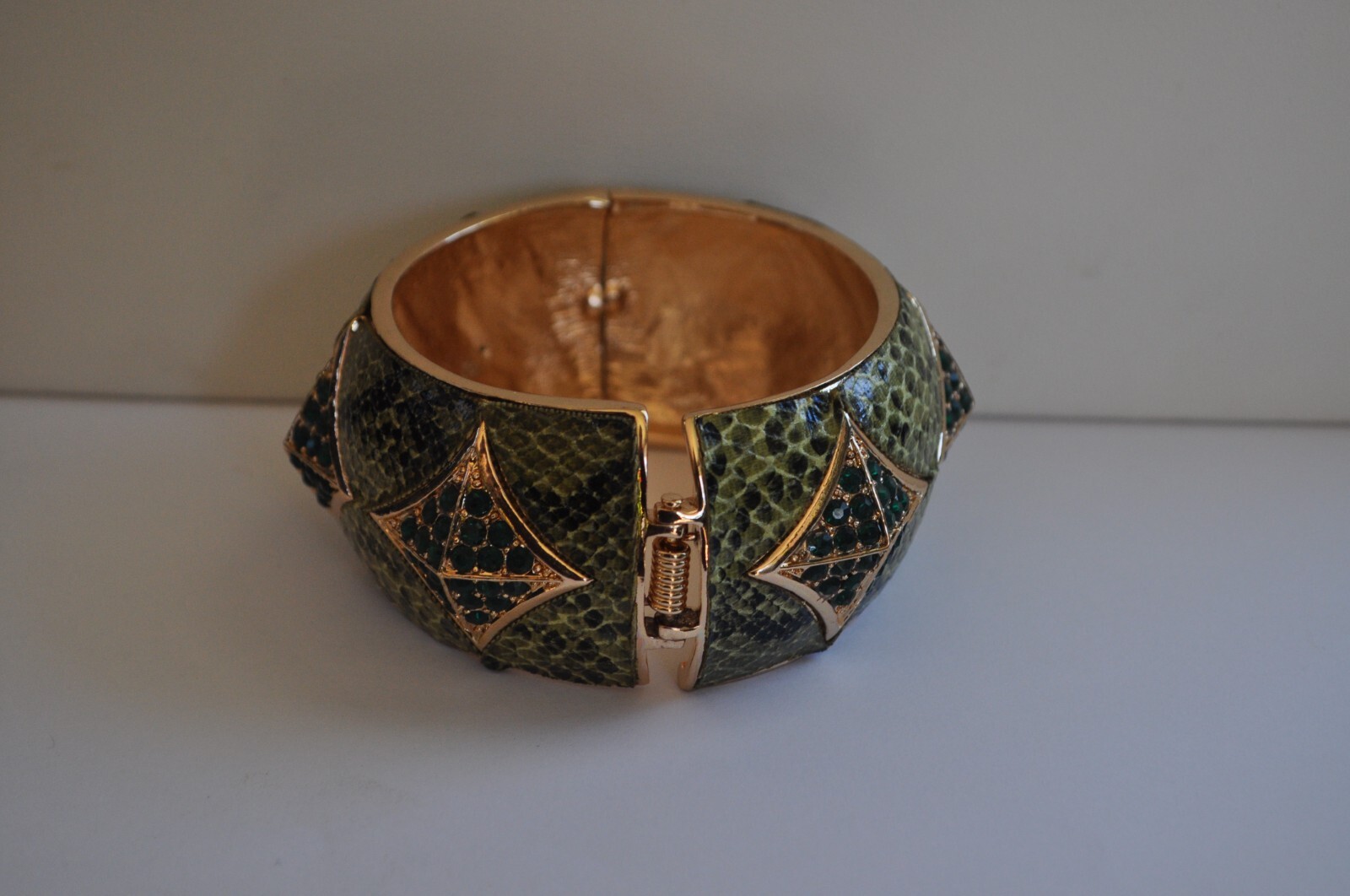 KIRKS FOLLY GREEN ENAMEL AND CRYSTAL CUFF BRACELET IN GOLD TONE