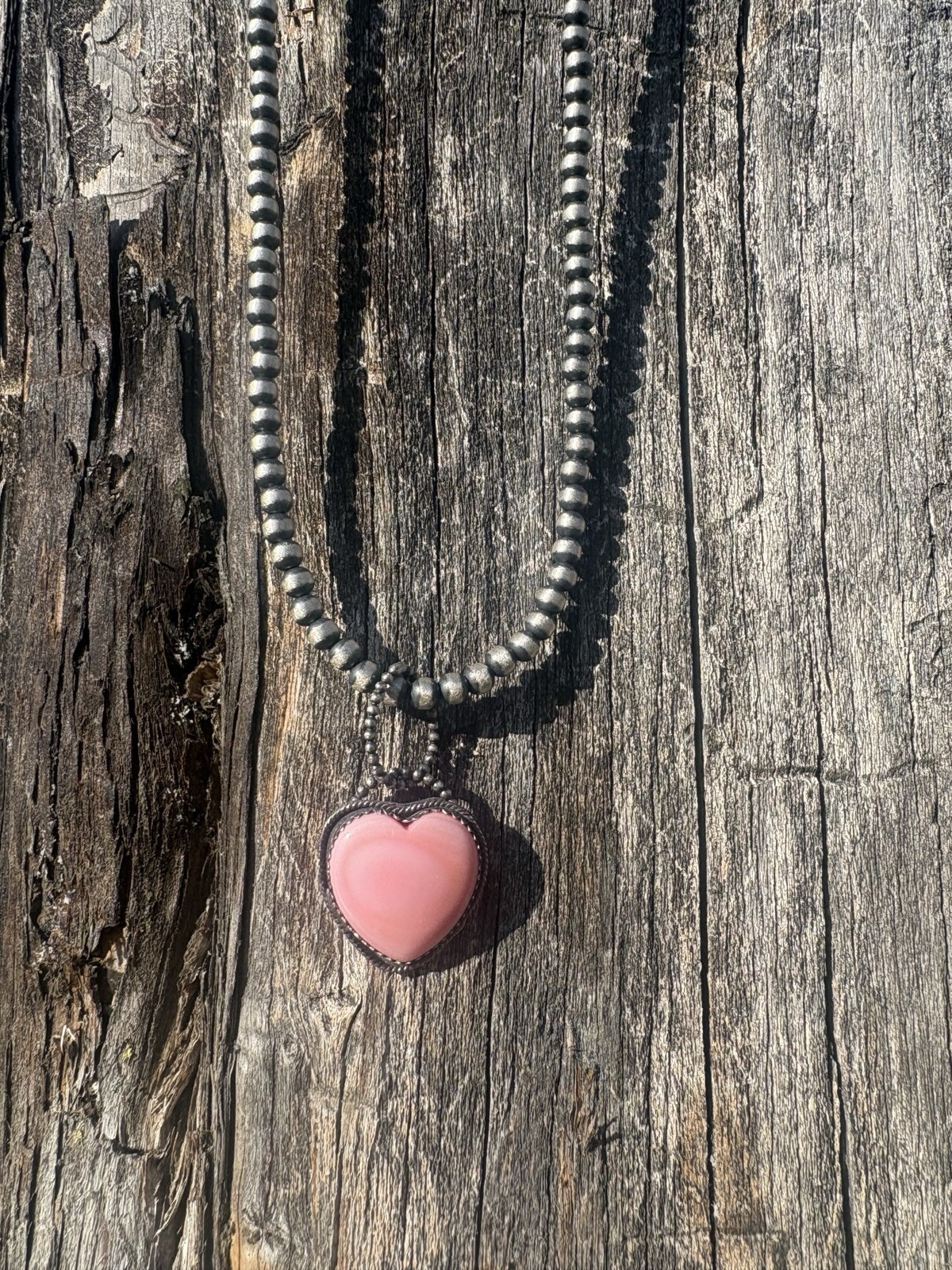 sterling silver pink conch heart pendant