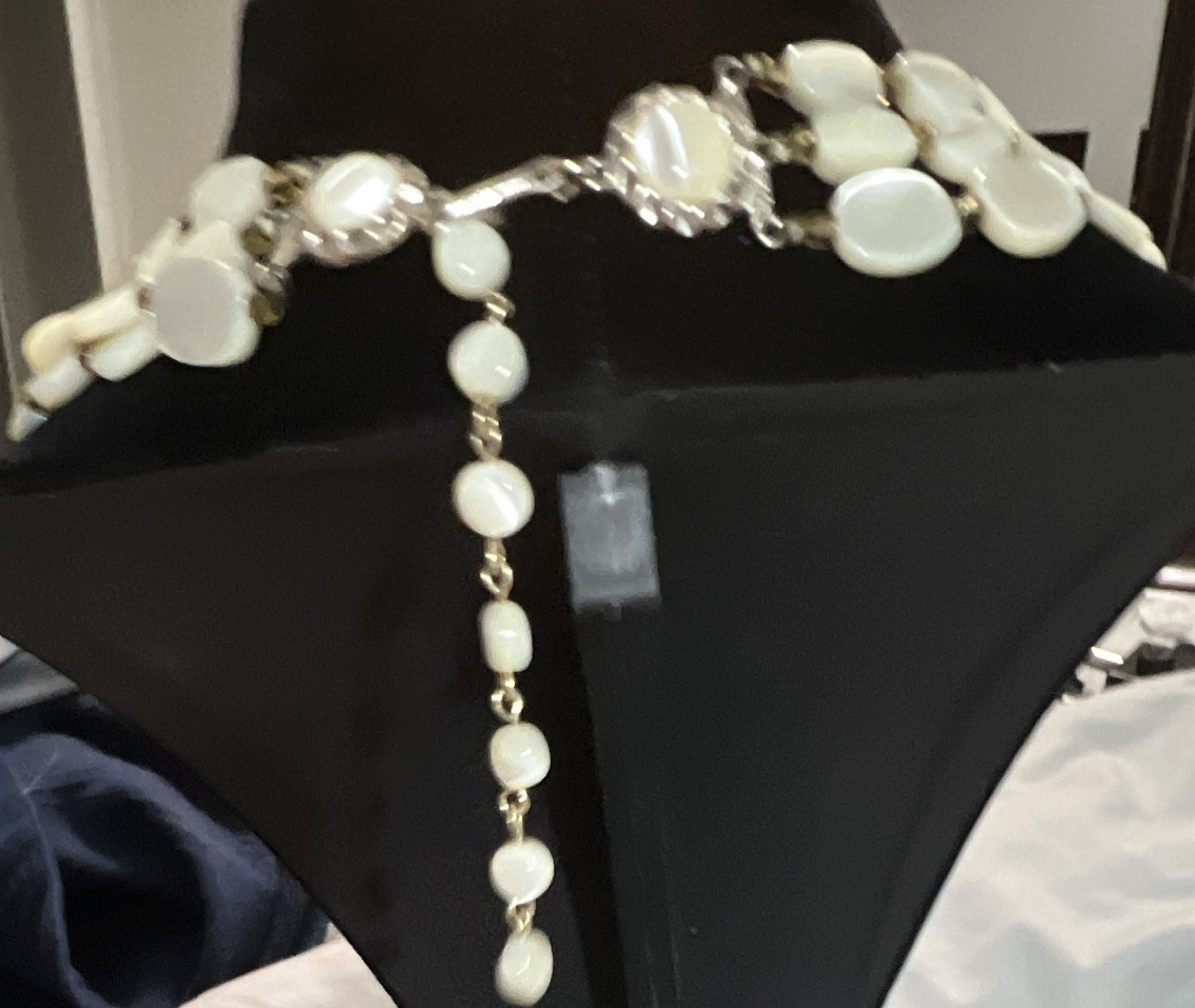 3 strand coin pearl necklace in excellent condition.