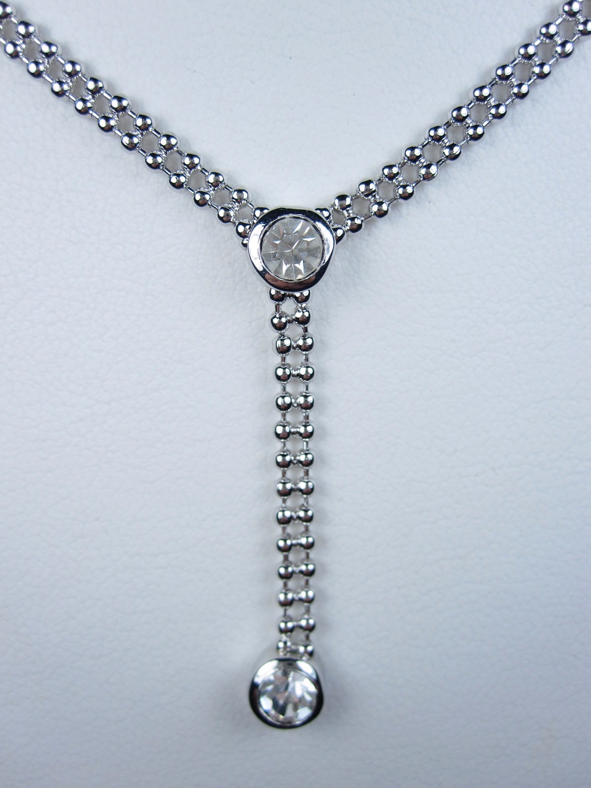 Nina Ricci Rhodium Plated Necklace with Swarovski Crystals – 14-16″ length 0589