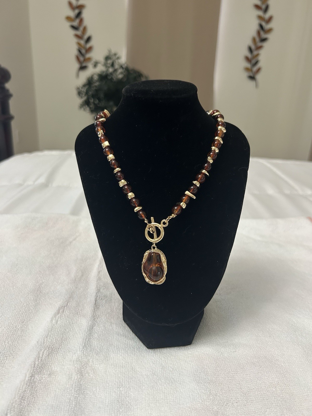 Brown Beaded Necklace Gold Tone Metal Oval Charm Pendant Toggle Bohemian