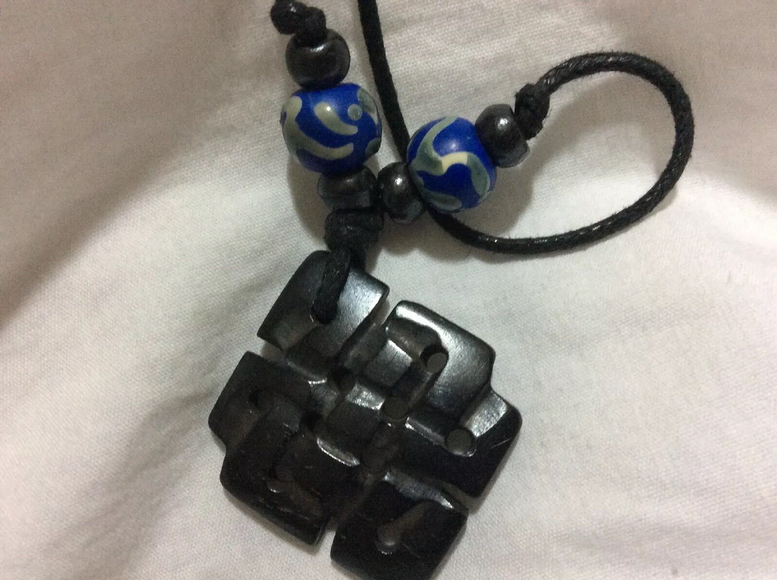 Endless Knot Pendant with Black Cotton Cord Handmade in Nepal – Black