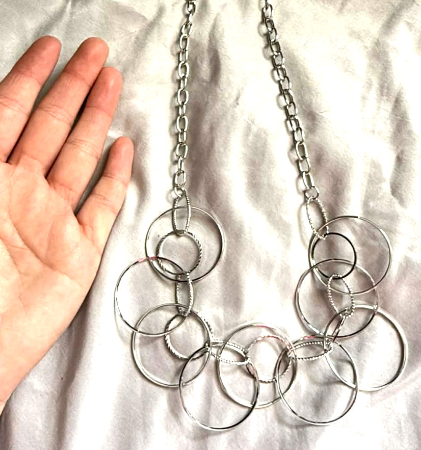 NEW Silver Tone Hoop Necklace Multiple Layers Interconnected Variated Circles