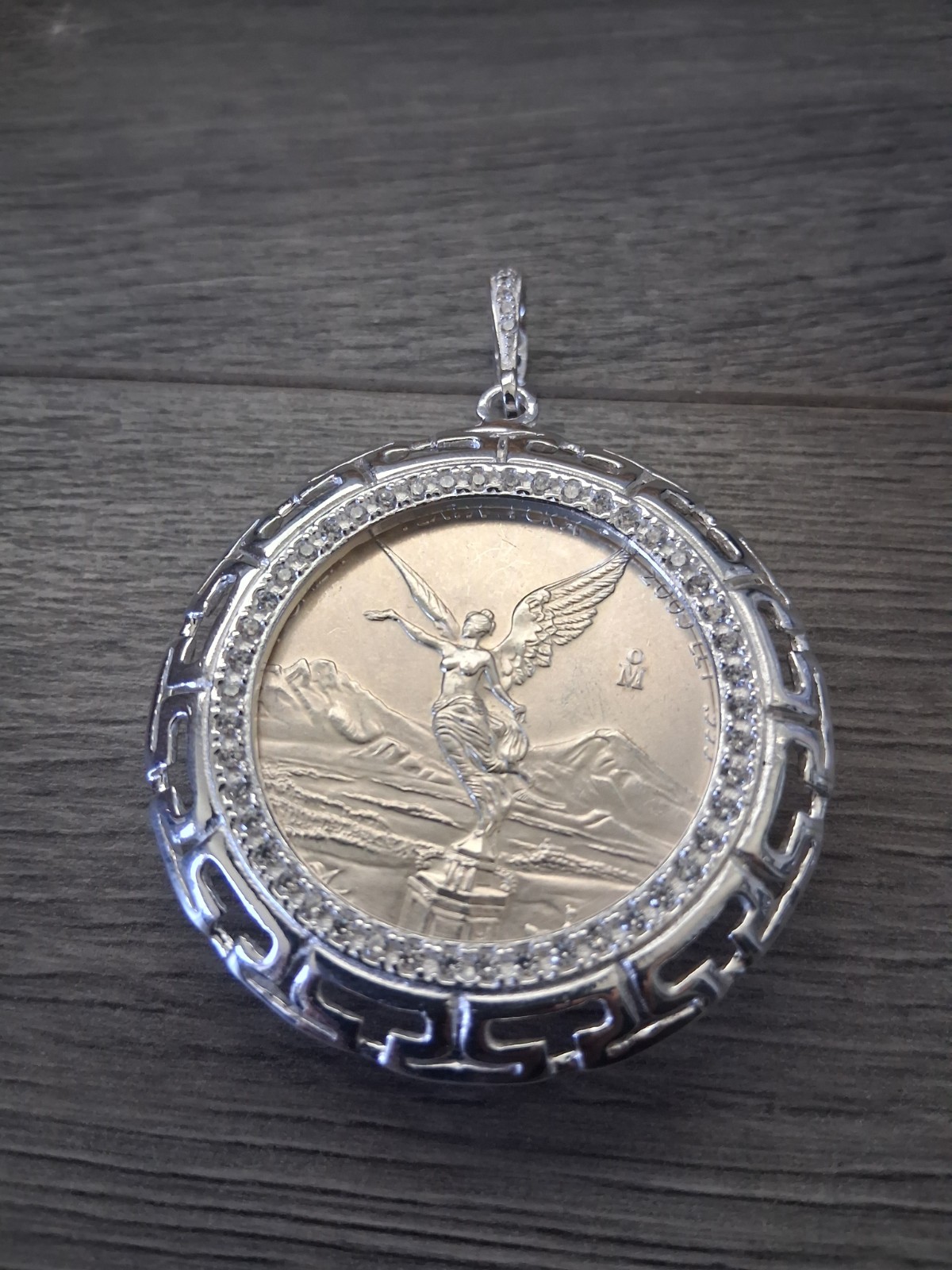 moneda centenario libertad de 1 OZ , moneda y bizel plata 925 plata real MX