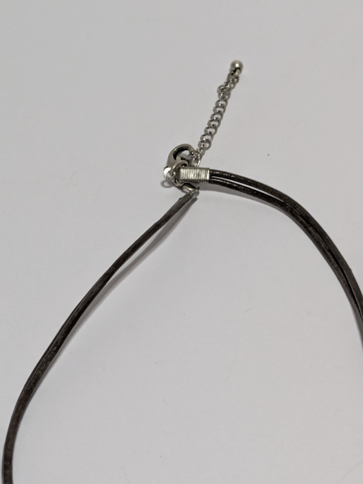 Faux Leather Brown Necklace With Silver Tone & Green Enamel Medallion Pendant