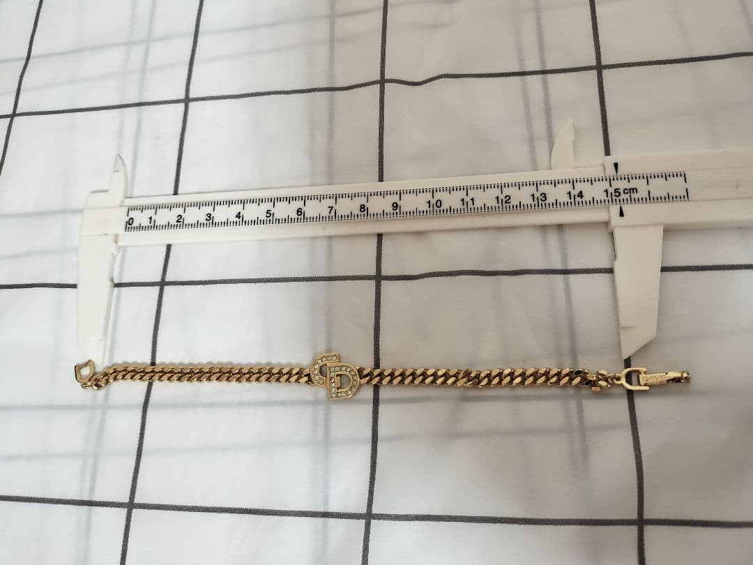 Christian Dior Logo Rhinestone Bracelet Gold Tone 6.5in Elegant Jewelry