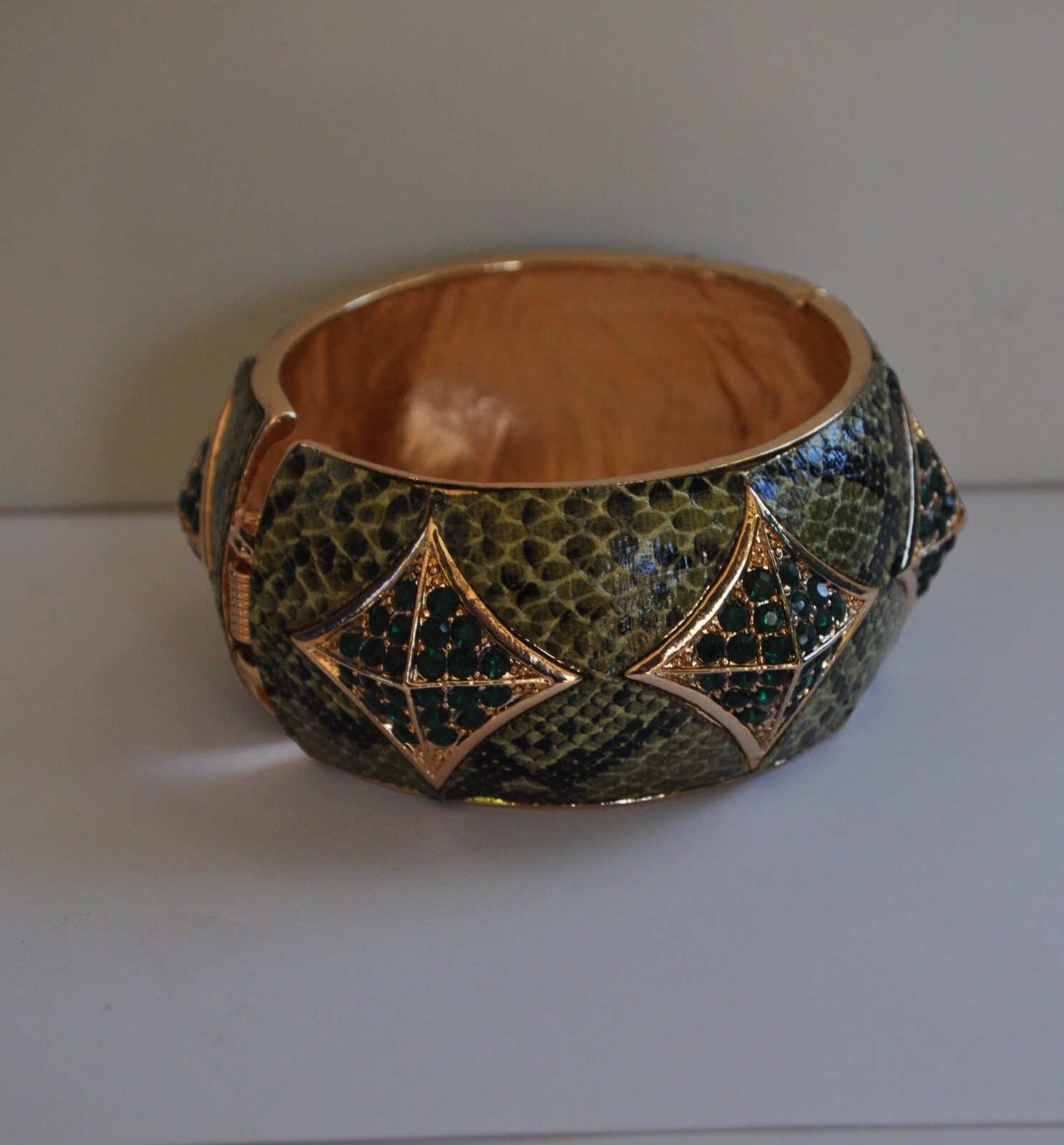 KIRKS FOLLY GREEN ENAMEL AND CRYSTAL CUFF BRACELET IN GOLD TONE