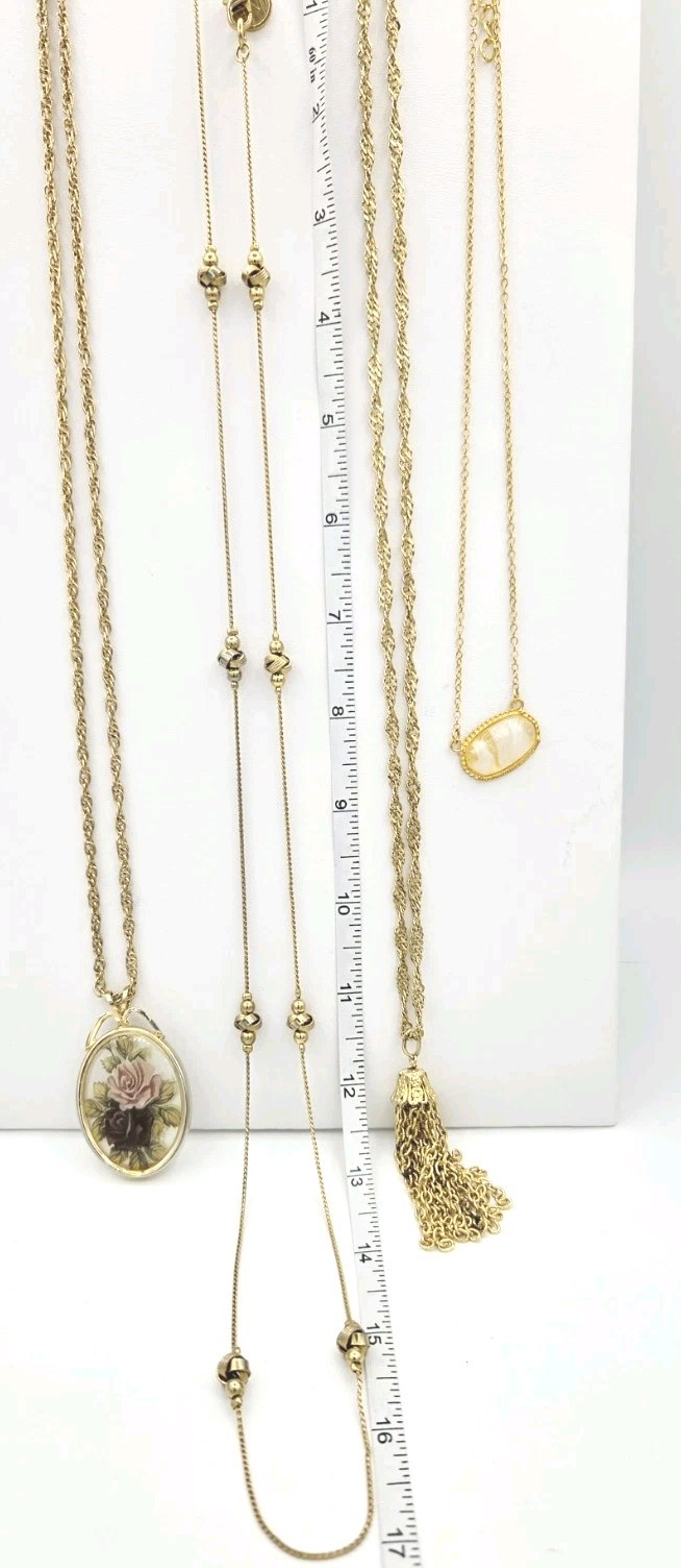 Lot 4 Necklaces W Pendants & Accents Goldtone 18- 32″ Lengths & AKI. 0313