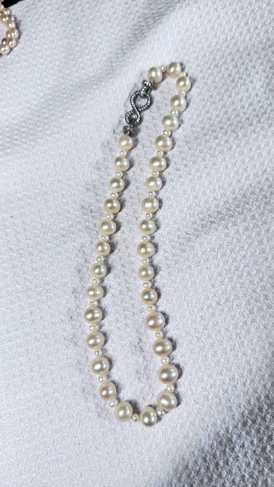 High-quality freshwater pearls with natural aurora luster. (11mm–12mm)