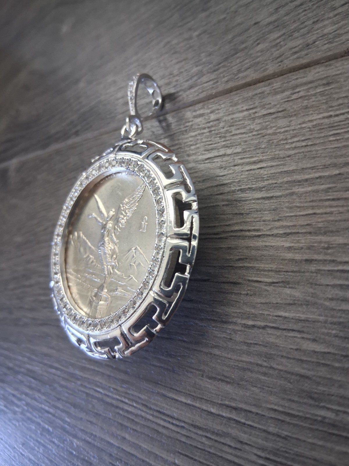 moneda centenario libertad de 1 OZ , moneda y bizel plata 925 plata real MX