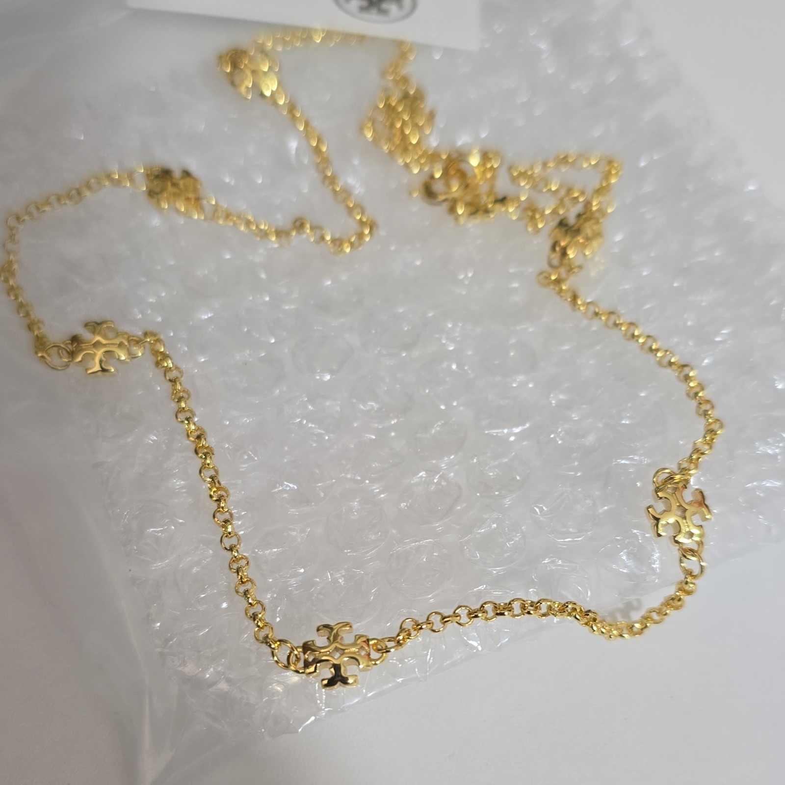 Tory Burch Gold Tone Logo Station Necklace Cable Chain Spring Ring Closure