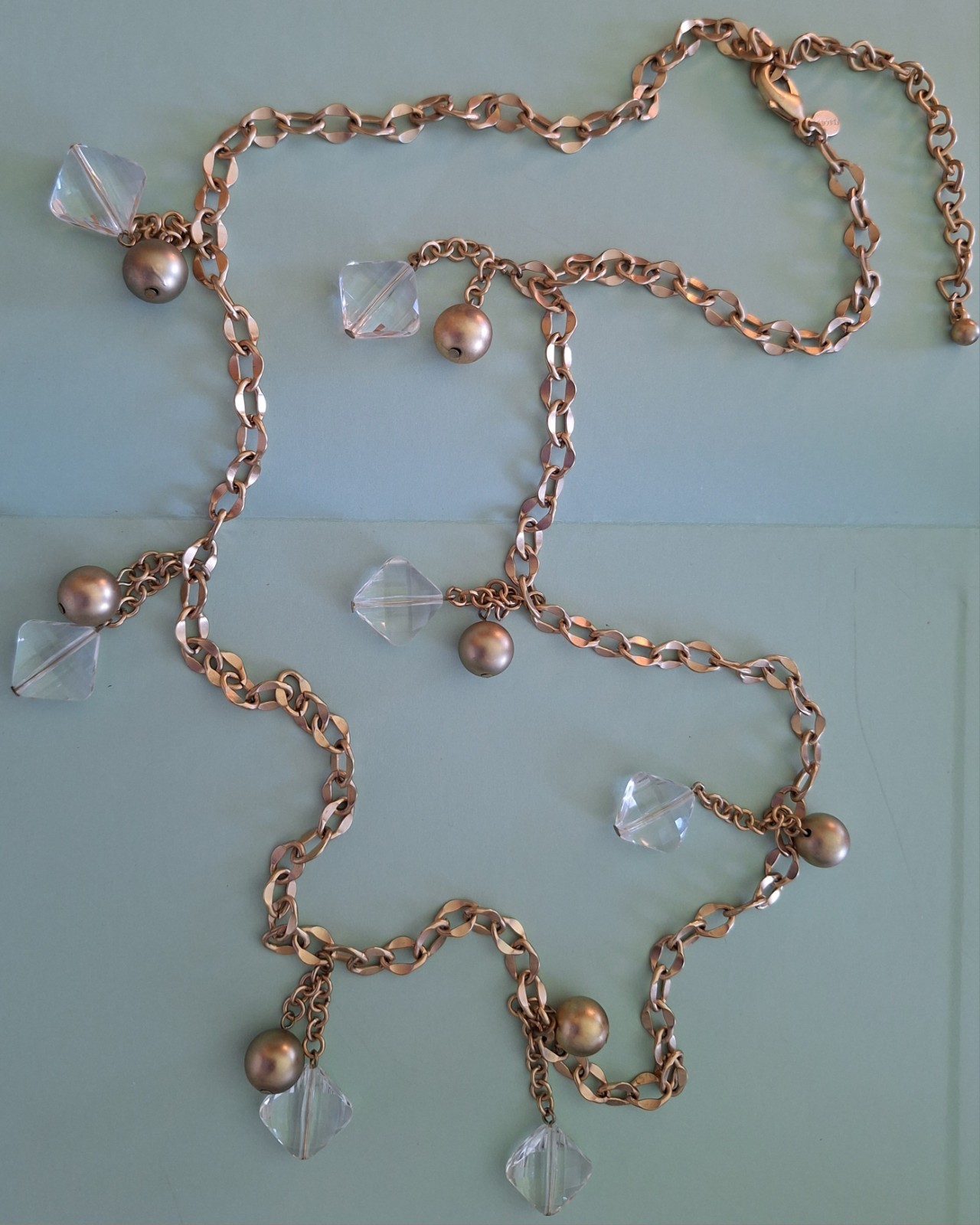 CHICO’S 18 INCH LONG GOLD COLORED BALLS AND COLORLESS STONE STATEMENT NECKLACE