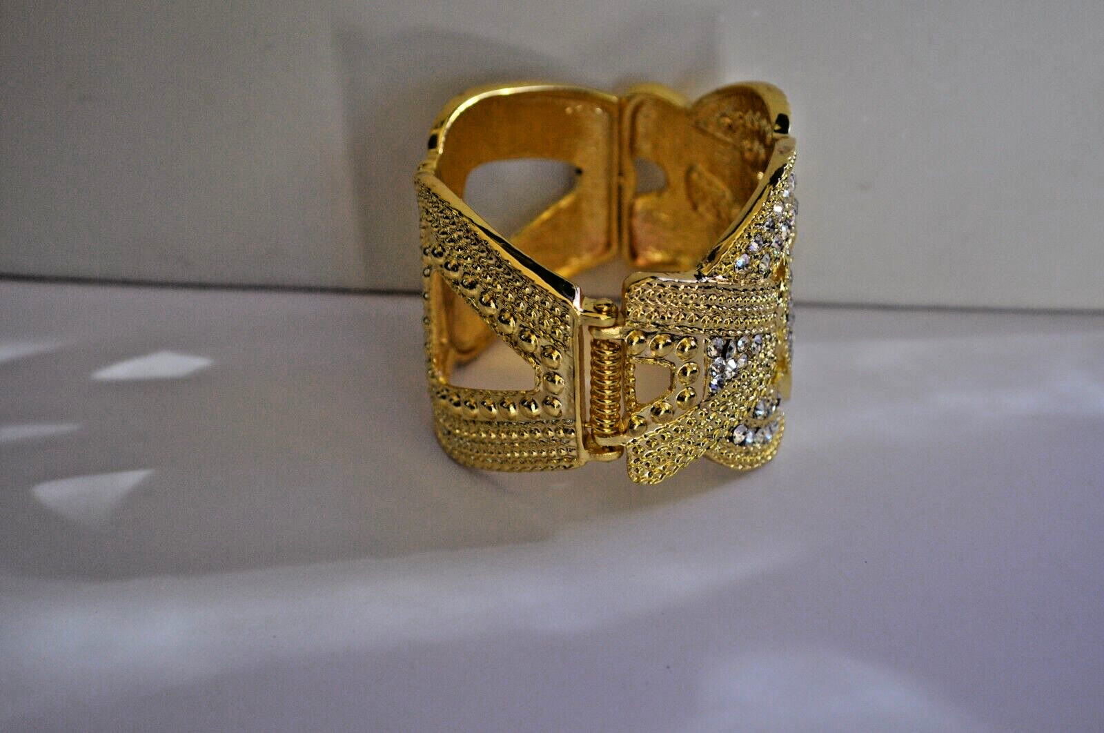 KIRKS FOLLY AURORA BOREALIS CRYSTAL CUFF BRACELET IN GOLD TONE