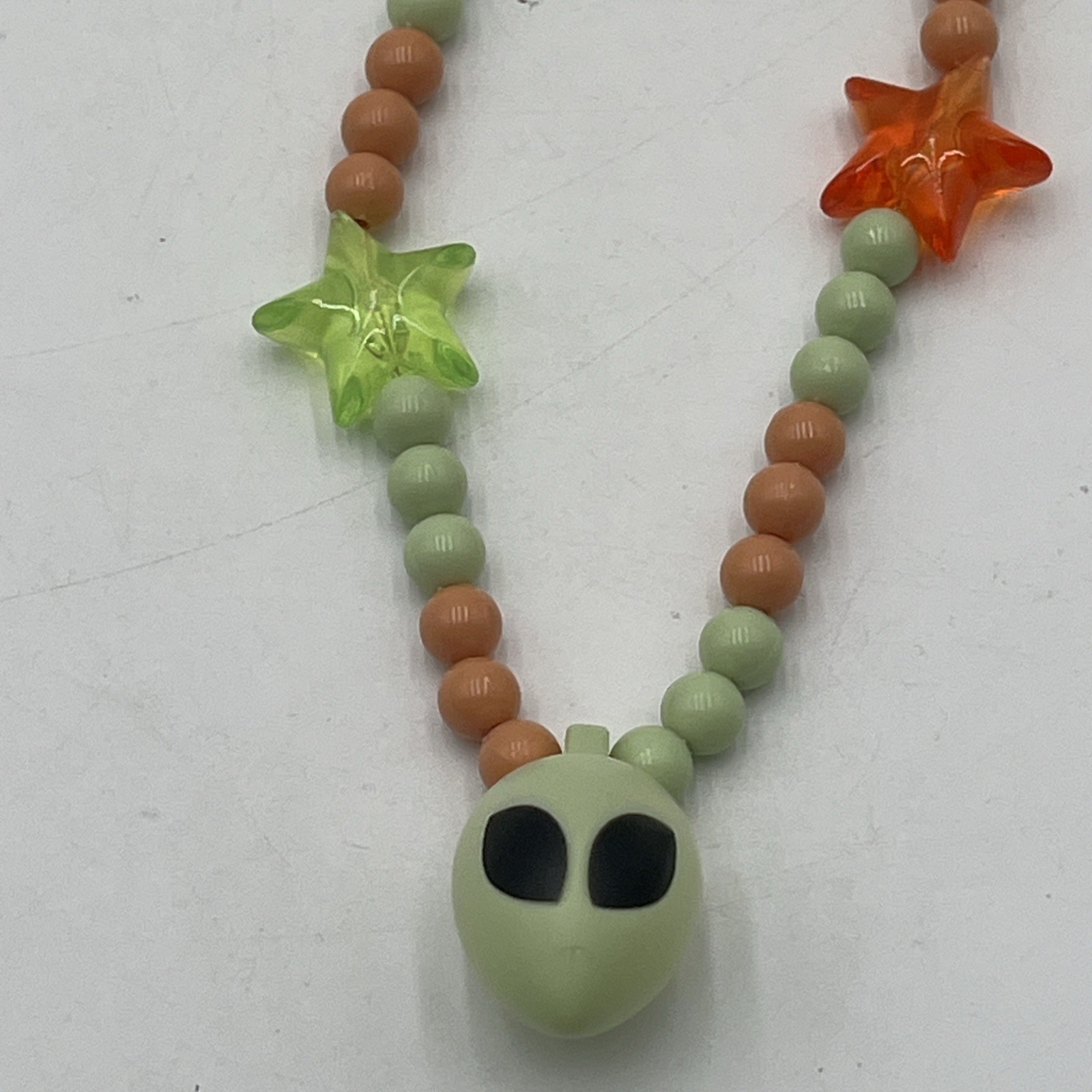 Lucky Star 15” Glow In The Dark Light Up Green & Orange Beaded Alien Necklace