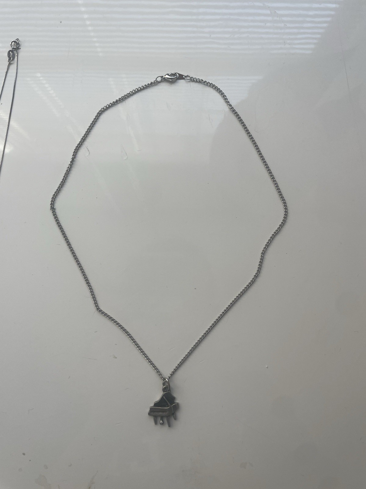Piano necklace with 16 inch chain